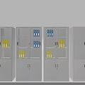 Gray Metal Bookcases With Glass And Solid Doors Storing Yellow And Blue Folders