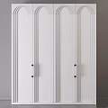 Stylish White Cabinet Doors Featuring Vertical Stripes and Polished Brass Handles