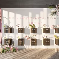 Commercial Display Equipment With Black Square Boxes And Floral Decorations On White Wall