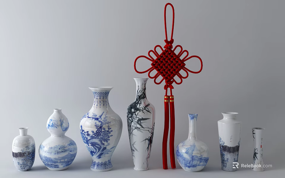 Blue And White Porcelain Vases With Floral Patterns And Red Chinese Knot Decor 3d model 