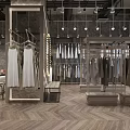 Stylish Clothing Store Interior With Hanging Dresses Display Racks Lights And Chevron Flooring