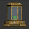 Ornate Golden Lantern Shaped Display Case With Green Orb And Decorative Base