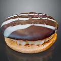 Chocolate Frosted Pastry With White Striped Decoration Light Brown Base And Cream Filling