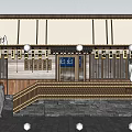 Traditional Wooden Shop Facade Evening View With Illuminated Signboard And People At Entrance
