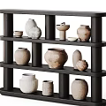 Artisanal Ceramic Vessels in Various Shapes and Sizes on Wooden Shelves