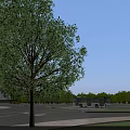 Two Modern Multi Story Office Buildings With Large Windows Road And Green Landscaping