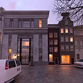 Modern Building Exterior With Stylish Swing Doors On Evening Street Scene