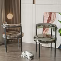 Modern Transparent Acrylic Dining Chairs With Black Metal Legs In Indoor Space With Green Plant