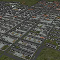 Aerial View Of Dense Residential Area With Neatly Arranged Houses And Green Grasslands