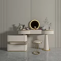 Elegant Light Colored Vanity Table With Round Gold Mirror Makeup Bottles Stool And Small Plant