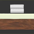 Wooden Storage Box With Light Green Mat And Three Rolled White Towels