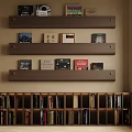 Modern Bookshelf Unit With Layered Wall Shelves And Closed Cabinet Filled With Books