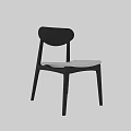 Modern Dining Chair With Black Frame Curved Backrest And Light Colored Seat