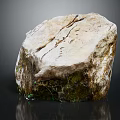 Natural Wooden Stone Displaying Surface Cracks Mossy Details and Rustic Organic Texture