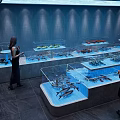 Modern Seafood Display Counter With Glass Tanks And Fresh Seafood In Restaurant