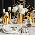 Elegant Dining Table Set With White Flower Bouquets Gold Decorative Items Tableware And Marble Placemats