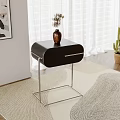 Black Nightstand with Metal Legs and Vase on Light Colored Rug with White Curtains