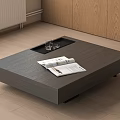 Sleek Modern Coffee Table With Glass Cups And Open Magazine In Living Room
