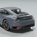 Gray Sleek Sports Car With Two Door Design And Sporty Alloy Wheels For Modern Driving