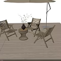 Three Wooden Outdoor Chairs With Small Table Vase And Beige Umbrella On Patio