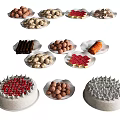 Variety of Assorted Dessert Plates With Chocolate Balls Cookies And Cakes