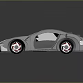 Sleek Modern Silver Sports Car With Shiny Exterior And Reflective Wheels