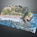 Natural Garden Landscape With Rocky Terrain Beach Water And Vegetated Hillside