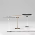 Modern Minimalist Table Lamps With Sleek Disc Shades And Slender Bases In Three Colors
