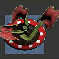 Potted Plant with Three Red Flowers Green Stems in Red White Dotted Pot on Black