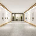 Spacious Modern Hallway Interior With White Walls Paintings On Both Sides And Glass Doors