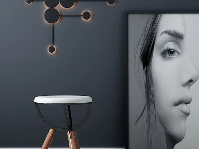 White Seat Stool With Wooden Legs On Gray Wall Near Black Circular Decor And Portrait 3d model