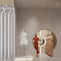 Modern Clothing Store Featuring Wedding Dress Red Gown Mannequins And Circular Archway