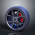 Sporty Car Wheel Design With Red Brake Caliper And Performance Tire