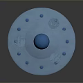 Blue Circular Object With Central Sphere And Surrounding Small Holes