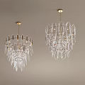 Modern Elegant Transparent Crystal Chandeliers With Golden Base Hanging On Light Colored Ceiling