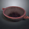 Hand Carved Artisan Bowl With Dual Handles And Dark Textured Surface