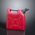 Red Plastic Jerry Can With Gray Spout And Metal Handle On Dark Surface