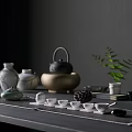 Stylish Tea Set With Teapot Teacups And Green Plant On Dark Wooden Table