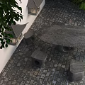 Stone Outdoor Table with Stools on Paved Ground Surrounded by Green Plants and Lanterns