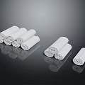 White Towel Rolls Of Various Sizes Neatly Arranged On Black Background With Reflections