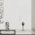 Two Stylish Table Lamps On Wooden Shelf With White Pleated Shades And Abstract Art