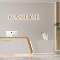 Modern Reception Desk with KASHCE Logo White Computer Decorative Figurine and Green Plant