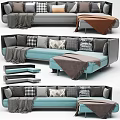Modern Blue Sectional Sofa With Gray Plaid And Patterned Pillows And Throw Blankets 3d model