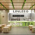 LINLEE Milk Tea Shop Interior With Wooden Tables Green Decor Fresh Drinks And Posters