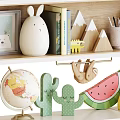 Kids Playroom Decorative Cabinet With Toys Globe Cactus And Building Blocks