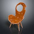 Unique Stylish Orange Textured Chair Design With Circular Cutout And Heart Shaped Seat