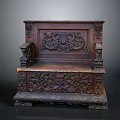 Antique Wooden Bench With Intricate Carved Animal Figures And Dark Wood Design