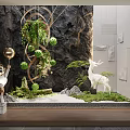 Whimsical Garden Decor With Hanging Plants Spherical Greenery Deer Sculpture And Mossy Sand Scene