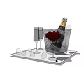 Wine Bottle and Champagne Glasses in Ice Bucket with Roses on Stylish Tray