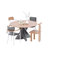 Round Wooden Table and Mixed Design Chairs with Decorative Green Vase
